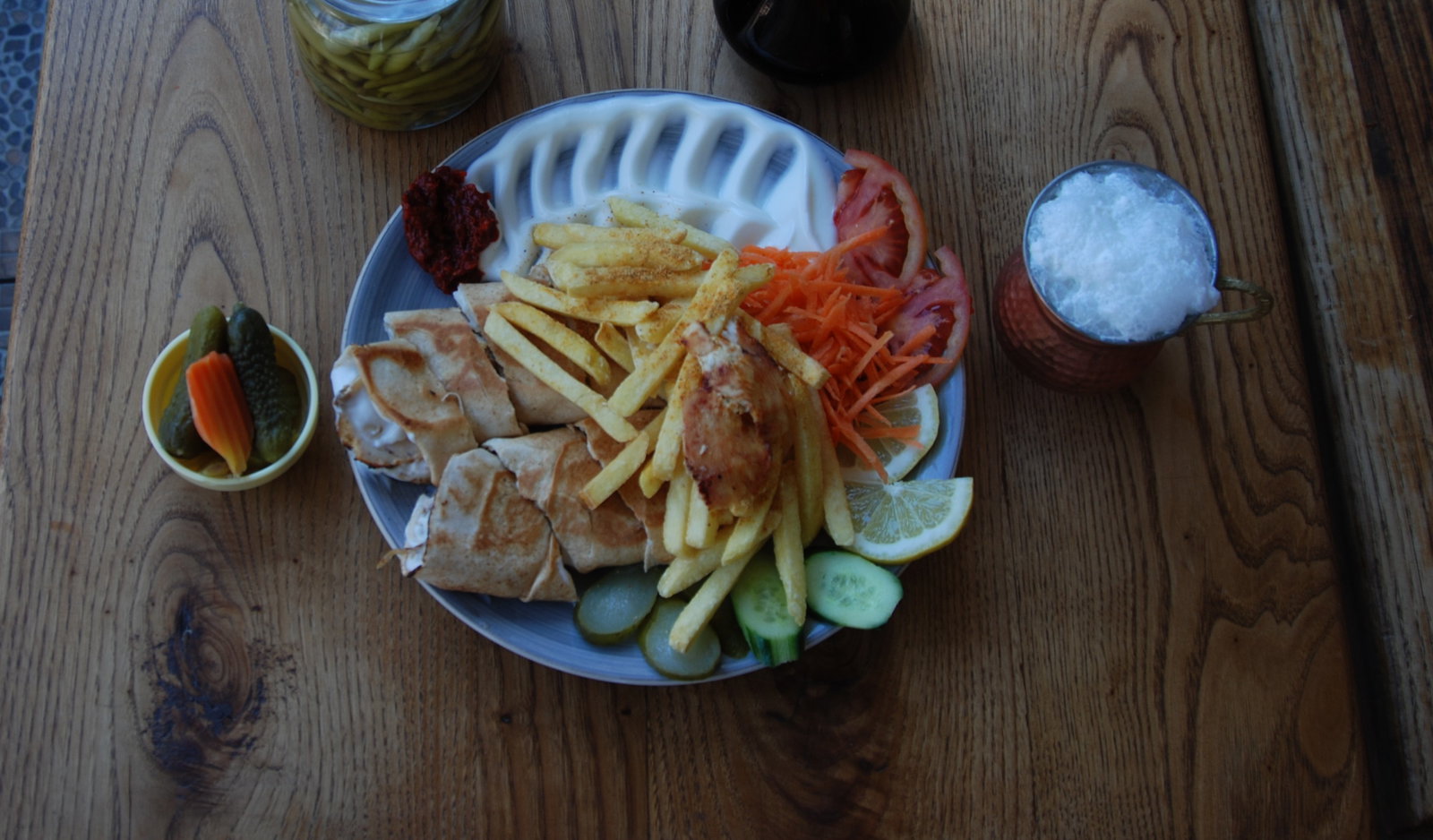 Full extra serving: Beyti mozzarella chicken wrap, Enfes garlic sauce, seasoned potatoes and salad